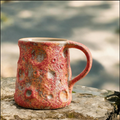 Artisanal Handcrafted Ceramic Coffee Mug – 9.5 oz Rustic Red & Orange Reactive Glaze Stoneware Cup with Crater Texture – Unique Lunar Pottery Tea Cup for Home & Office