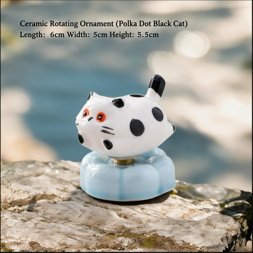 Ceramic Rotating Cat Figurine – Cute Black Polka Dot Kitten Desk Toy on Light Blue Base