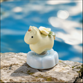Ceramic Rotating Horse Figurine – Cute Pale Yellow Pony with Sculpted Flower Saddle & Blue Lotus Base