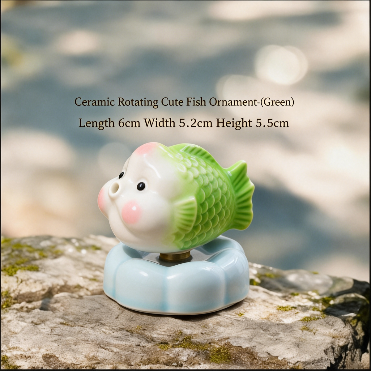 Ceramic Rotating Fish Figurine – Cute Green Spinning Goldfish Desk Toy on Light Blue Base