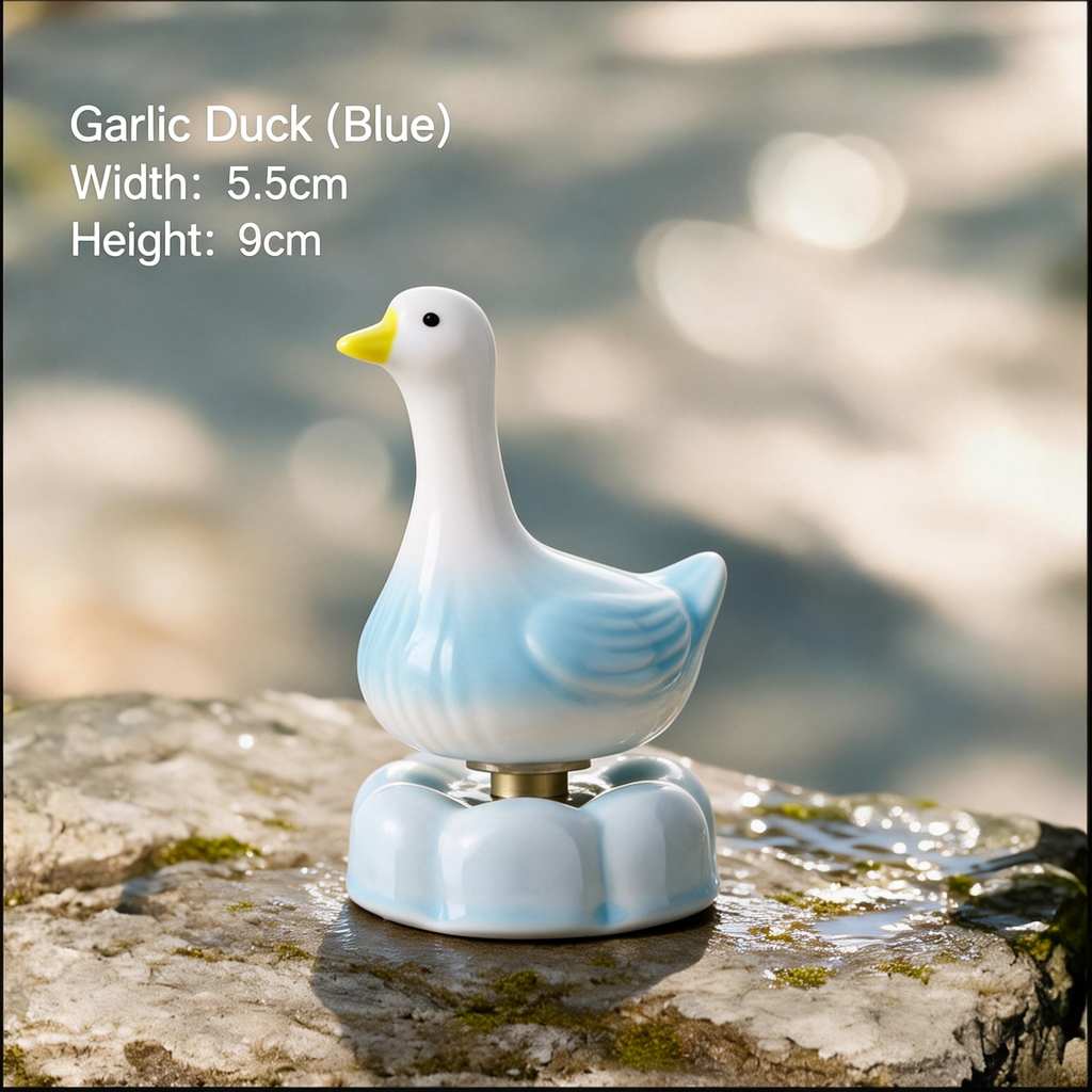 Ceramic Rotating Garlic Duck Figurine – Cute Blue Gradient Goose Desk Toy on Light Blue Base