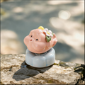 Ceramic Rotating Pig Figurine – Cute Chubby Pink Piggy with Floral Crown on Light Blue Lotus Base