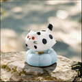 Ceramic Rotating Cat Figurine – Cute Black Polka Dot Kitten Desk Toy on Light Blue Base