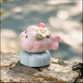 Ceramic Rotating Pig Figurine – Cute Lilac Piggy with Pink & White Floral Crown on Light Blue Lotus Base