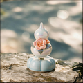 Iridescent Ceramic Rotating Gourd Figurine – Peach Rose Wu Lou with Pearl Luster & Light Blue Base